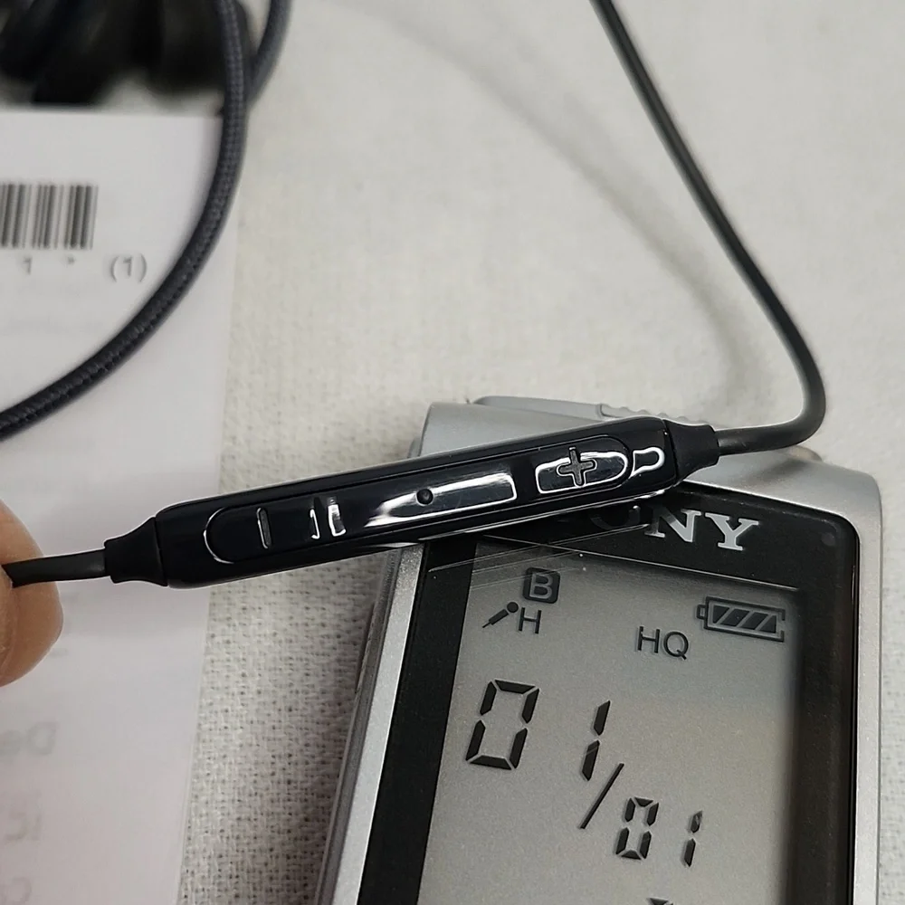 Sony ICD-BX800 Recorder, headphones and Sharp EL-W516 Calculator